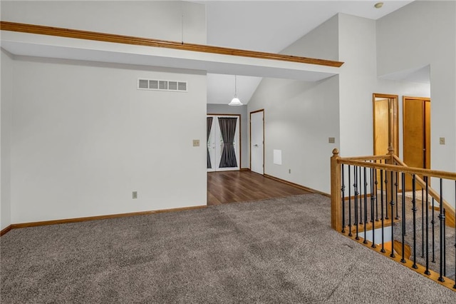 22005 Gracie Dr, Peculiar, MO 64078 - carpeted spare room featuring baseboards and high vaulted ceiling