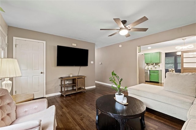1521 W 22nd St, Lawrence, KS 66046 - living room with a ceiling fan and dark wood-style floors
