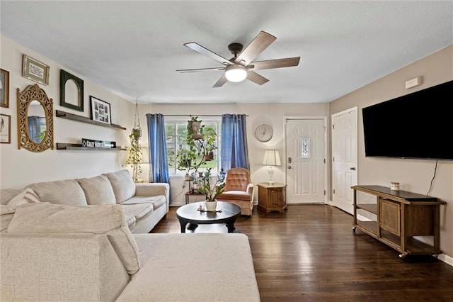 1521 W 22nd St, Lawrence, KS 66046 - living room featuring ceiling fan and wood finished floors