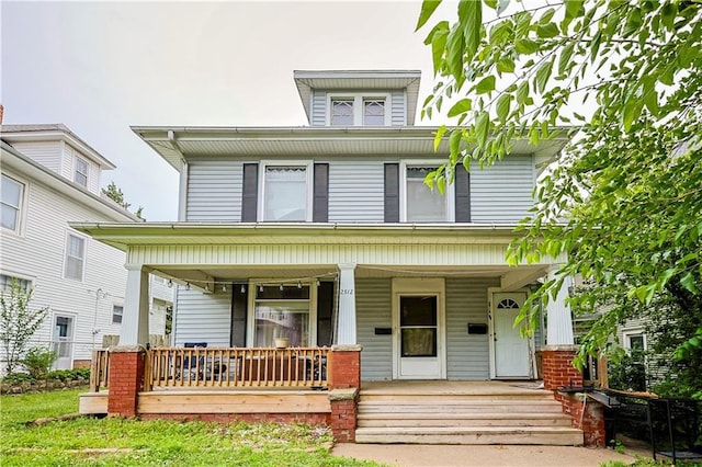 2512 Jules St, Saint Joseph, MO 64501 - american foursquare style home featuring covered porch