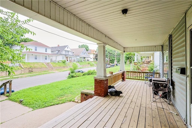 2512 Jules St, Saint Joseph, MO 64501 - porch with a residential view and a yard