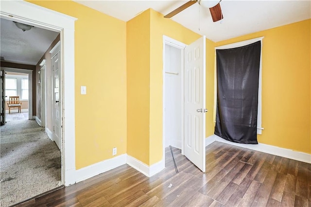 2512 Jules St, Saint Joseph, MO 64501 - unfurnished bedroom featuring wood finished floors and ceiling fan