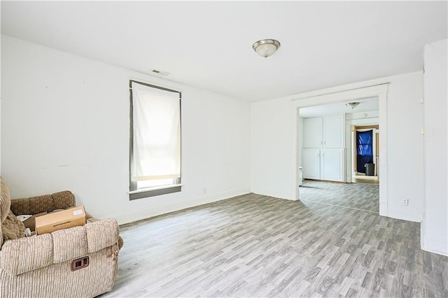2512 Jules St, Saint Joseph, MO 64501 - unfurnished room featuring light wood-style flooring and baseboards
