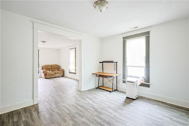 2512 Jules St, Saint Joseph, MO 64501 - unfurnished room with wood finished floors and baseboards