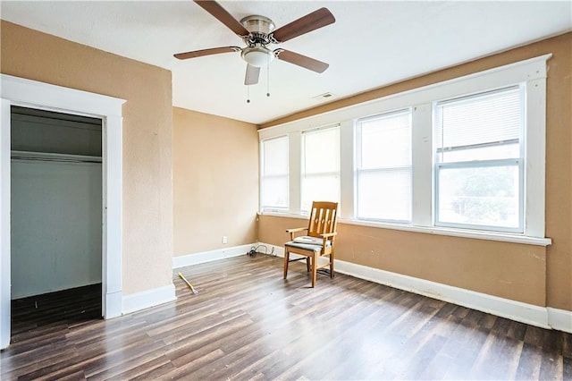 2512 Jules St, Saint Joseph, MO 64501 - living area with wood finished floors and a ceiling fan