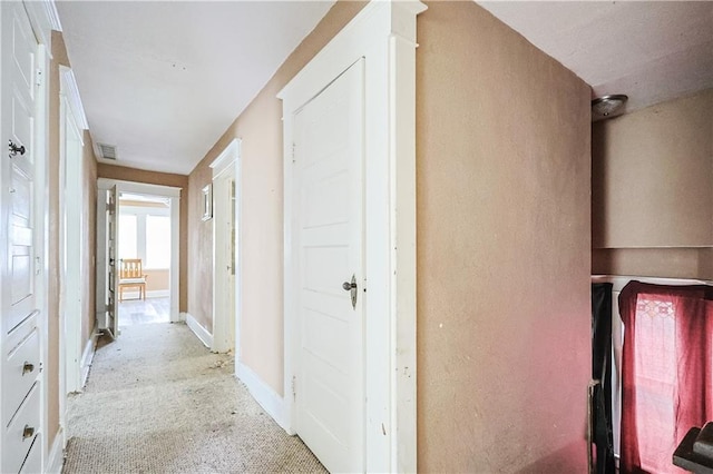 2512 Jules St, Saint Joseph, MO 64501 - hallway featuring light carpet and baseboards