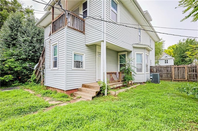 2512 Jules St, Saint Joseph, MO 64501 - rear view of house featuring a balcony and a porch