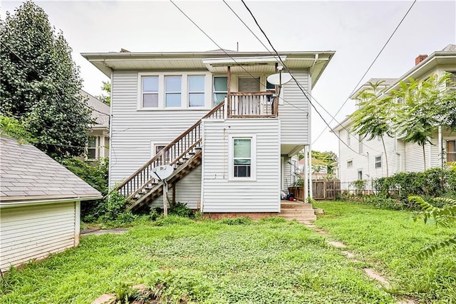 2512 Jules St, Saint Joseph, MO 64501 - back of house featuring stairs