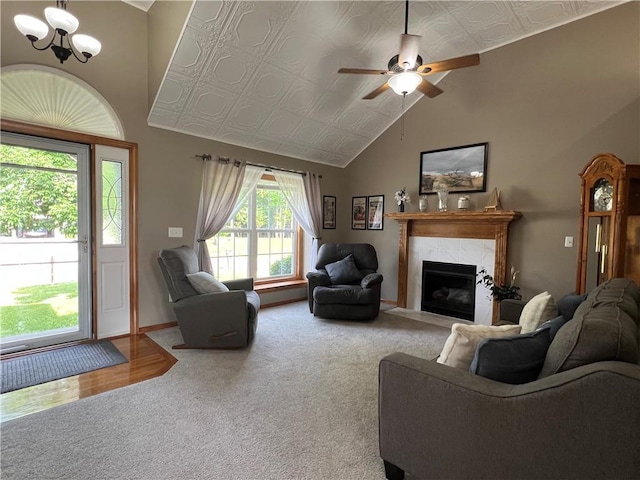 938 S 17th St, Leavenworth, KS 66048 - living area with a premium fireplace, carpet flooring, an ornate ceiling, a ceiling fan, and lofted ceiling