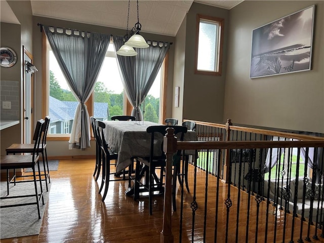 938 S 17th St, Leavenworth, KS 66048 - dining area with plenty of natural light and light wood-style floors