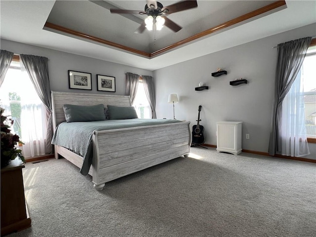938 S 17th St, Leavenworth, KS 66048 - bedroom featuring a tray ceiling, carpet floors, and ceiling fan