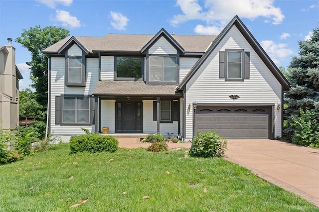 18970 W 115th Ter, Olathe, KS 66061 - view of front of home with an attached garage, driveway, and a front lawn