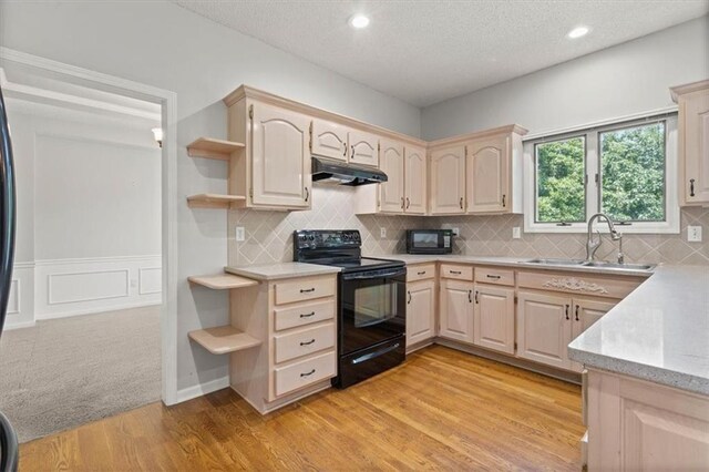 18970 W 115th Ter, Olathe, KS 66061 - kitchen featuring black appliances, open shelves, under cabinet range hood, light brown cabinets, and recessed lighting