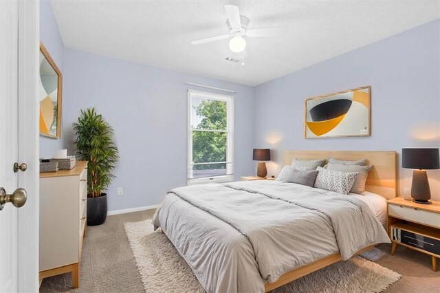18970 W 115th Ter, Olathe, KS 66061 - carpeted bedroom featuring ceiling fan and a textured ceiling