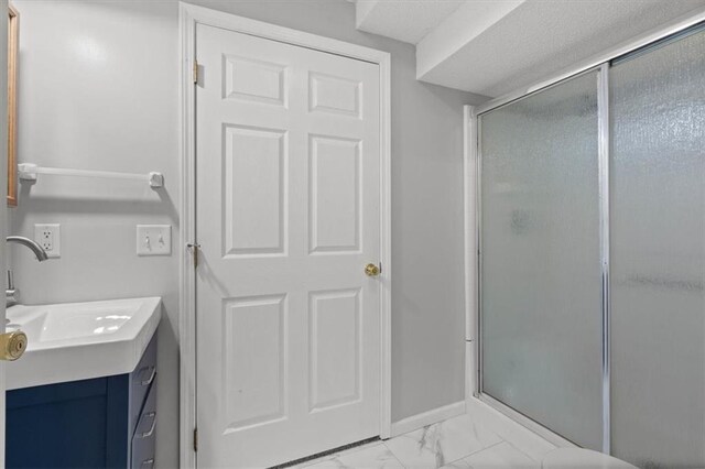 18970 W 115th Ter, Olathe, KS 66061 - full bathroom with a stall shower, vanity, and marble look tiles