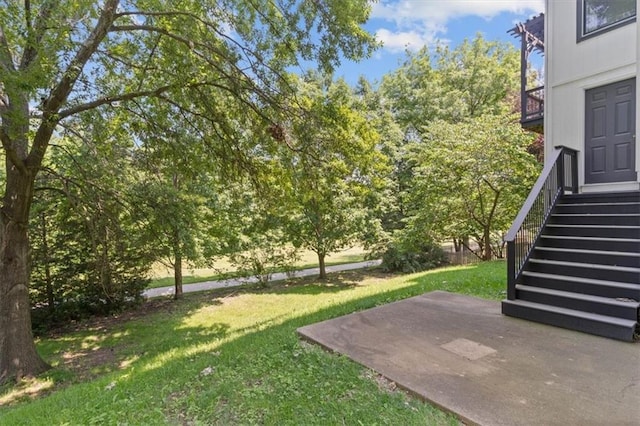 18970 W 115th Ter, Olathe, KS 66061 - view of green lawn with a patio area