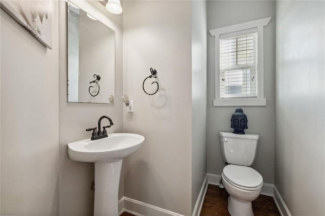936 SW Raintree Dr, Lees Summit, MO 64082 - half bath featuring toilet and wood finished floors