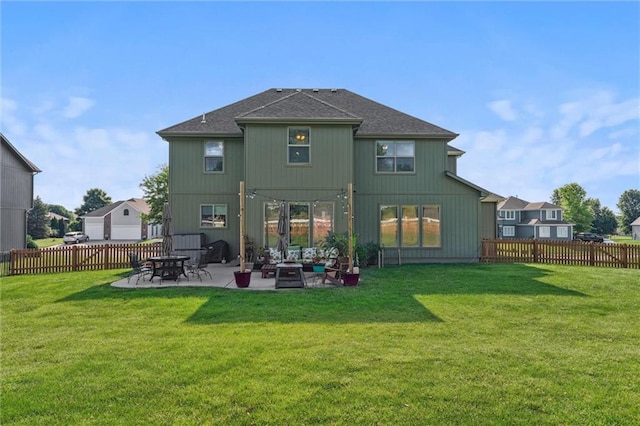 936 SW Raintree Dr, Lees Summit, MO 64082 - rear view of property with a patio area, a fenced backyard, and roof with shingles