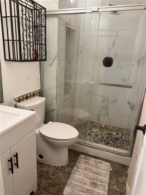 397 W Johnston St, Olathe, KS 66061 - full bath featuring vanity and a stall shower