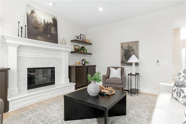 14600 Reinhardt Ln, Leawood, KS 66224 - living room featuring wood finished floors, a fireplace, and recessed lighting