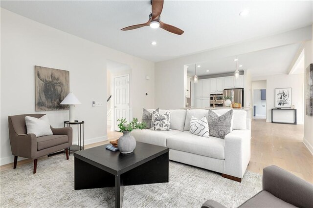 14600 Reinhardt Ln, Leawood, KS 66224 - living room featuring light wood-type flooring, a ceiling fan, and recessed lighting