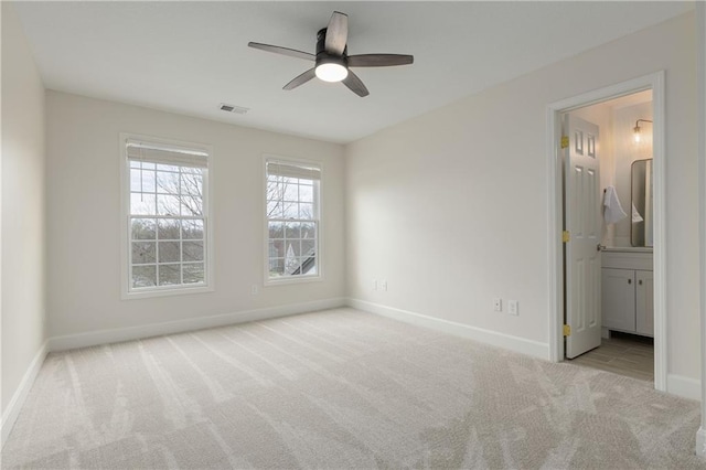 14600 Reinhardt Ln, Leawood, KS 66224 - unfurnished bedroom with carpet flooring, connected bathroom, and a ceiling fan