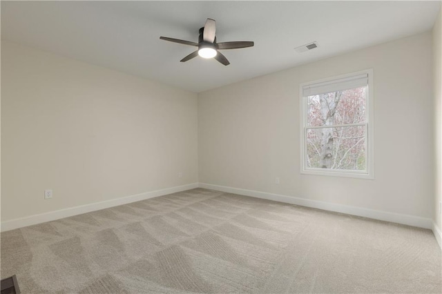 14600 Reinhardt Ln, Leawood, KS 66224 - spare room with light colored carpet and ceiling fan