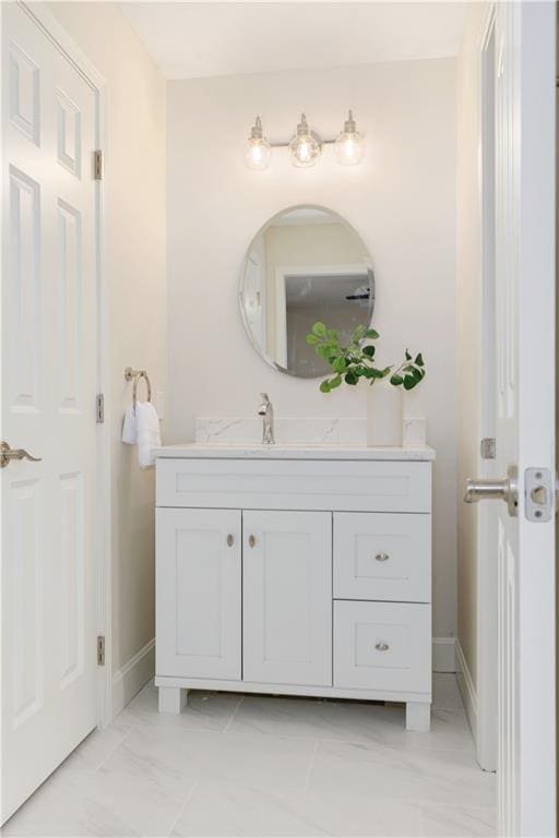 14600 Reinhardt Ln, Leawood, KS 66224 - bathroom featuring vanity and marble look tile flooring