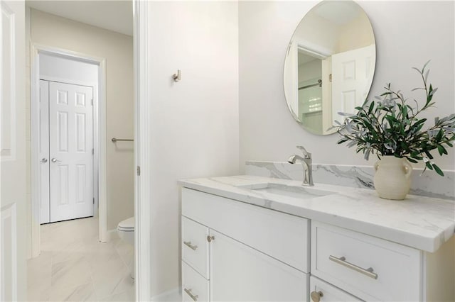 14600 Reinhardt Ln, Leawood, KS 66224 - bathroom featuring vanity and marble look tiles