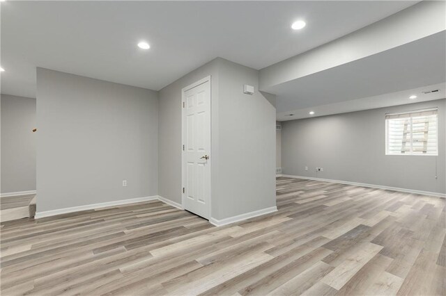 14600 Reinhardt Ln, Leawood, KS 66224 - below grade area featuring light wood-style floors and recessed lighting