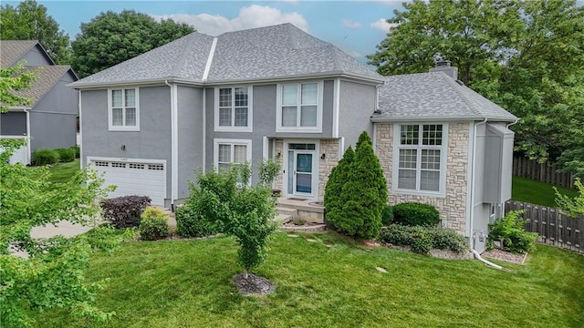 5303 Hallet St, Shawnee, KS 66216 - view of front facade featuring stone siding, stucco siding, a garage, and a chimney