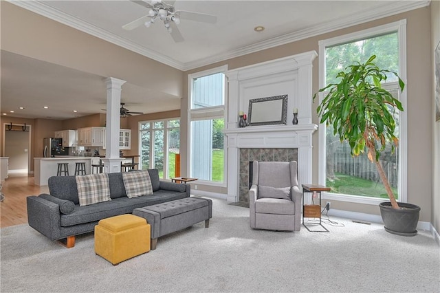 5303 Hallet St, Shawnee, KS 66216 - living area featuring ceiling fan, crown molding, a fireplace, light colored carpet, and recessed lighting