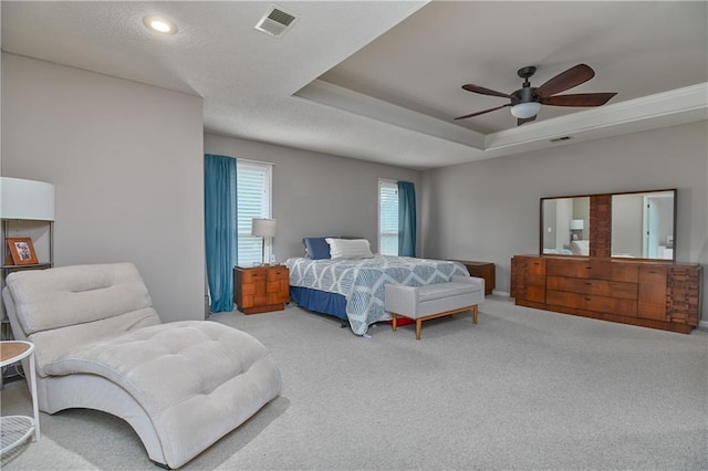 5303 Hallet St, Shawnee, KS 66216 - carpeted bedroom with a raised ceiling and ceiling fan
