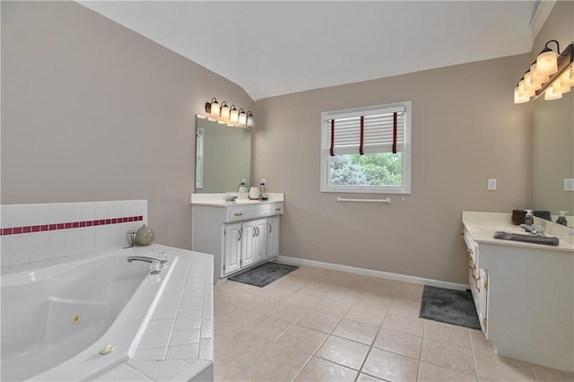 5303 Hallet St, Shawnee, KS 66216 - full bath featuring two vanities, a jetted tub, tile patterned floors, and vaulted ceiling