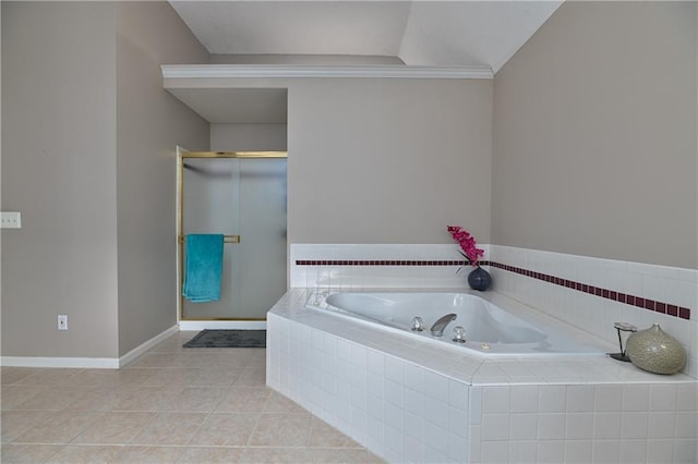 5303 Hallet St, Shawnee, KS 66216 - bathroom with a bath, a stall shower, and tile patterned floors