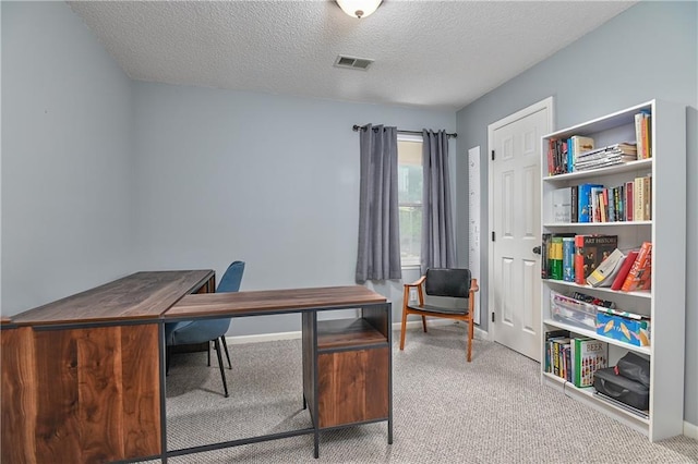 5303 Hallet St, Shawnee, KS 66216 - carpeted office space featuring a textured ceiling and baseboards