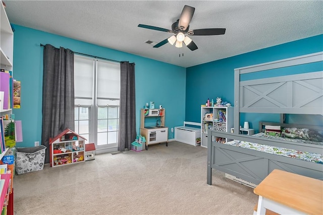 5303 Hallet St, Shawnee, KS 66216 - bedroom with carpet, a textured ceiling, and ceiling fan