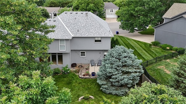 5303 Hallet St, Shawnee, KS 66216 - back of property featuring a shingled roof