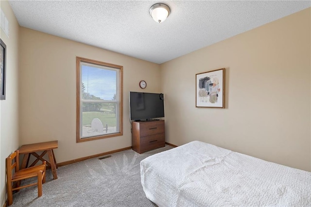 103 Bridgeport Dr, Smithville, MO 64089 - bedroom with carpet floors and a textured ceiling