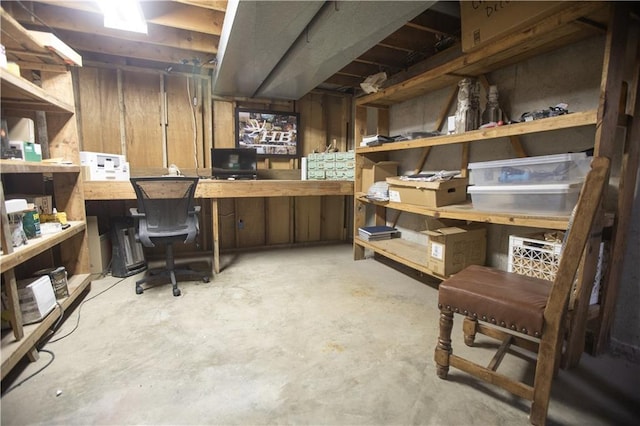11001 S Perdue Rd, Grain Valley, MO 64029 - office featuring unfinished concrete flooring and a workshop area