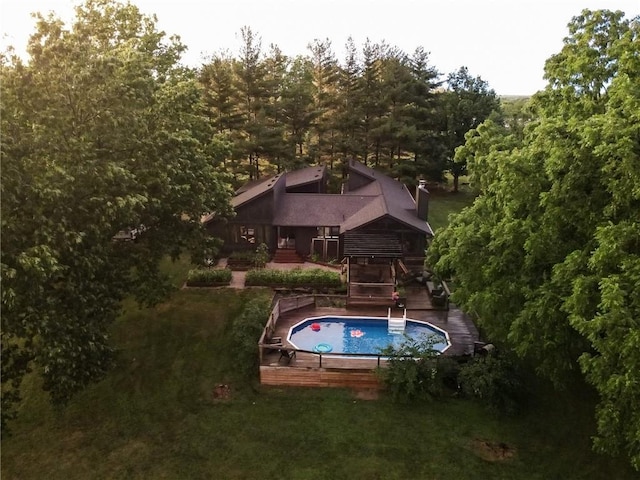 11001 S Perdue Rd, Grain Valley, MO 64029 - outdoor pool with stairs and a deck