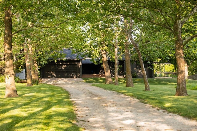 11001 S Perdue Rd, Grain Valley, MO 64029 - view of front facade featuring driveway and a front yard