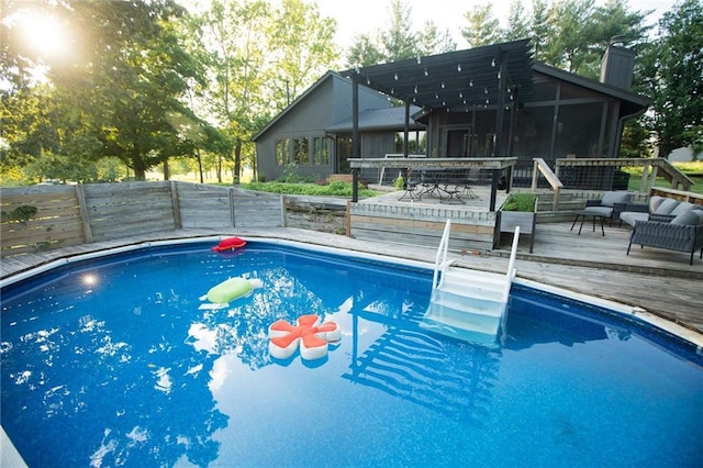 11001 S Perdue Rd, Grain Valley, MO 64029 - outdoor pool with a deck, an outdoor hangout area, and a sunroom