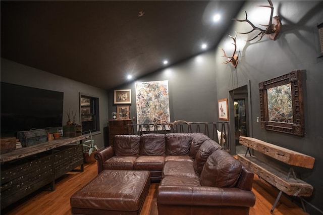 11001 S Perdue Rd, Grain Valley, MO 64029 - living room with wood finished floors, lofted ceiling, and recessed lighting