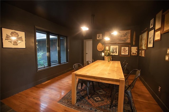 11001 S Perdue Rd, Grain Valley, MO 64029 - dining area with wood finished floors and baseboards