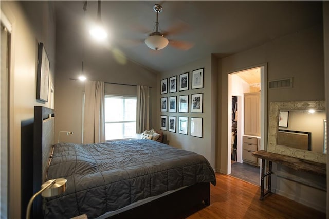 11001 S Perdue Rd, Grain Valley, MO 64029 - bedroom with dark wood-style floors, lofted ceiling, and ceiling fan