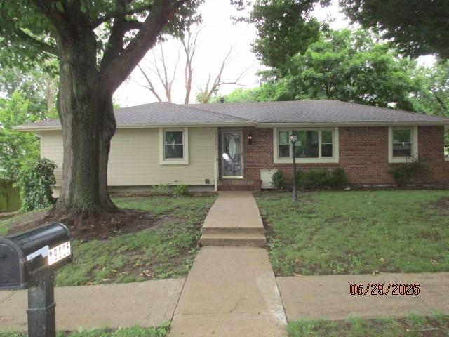 19005 E 18th Ter N, Independence, MO 64058 - single story home featuring a front lawn and brick siding