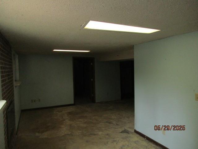 19005 E 18th Ter N, Independence, MO 64058 - empty room with a textured ceiling