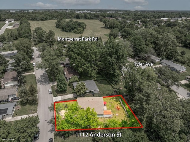 1112 Anderson St, Warrensburg, MO 64093 - aerial view of property and surrounding area featuring property boundaries highlighted