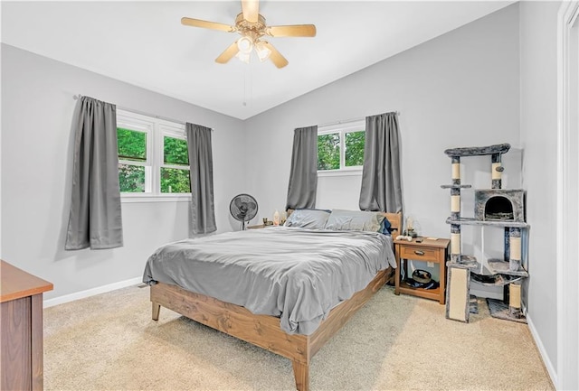 1112 Anderson St, Warrensburg, MO 64093 - bedroom with vaulted ceiling, carpet floors, and ceiling fan